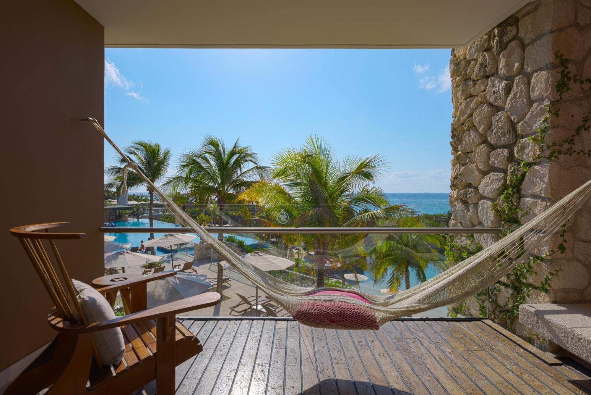 Hotel Xcaret Mexico All Parks All Fun Inclusive Playa del Carmen Esterno foto Hammock on a balcony